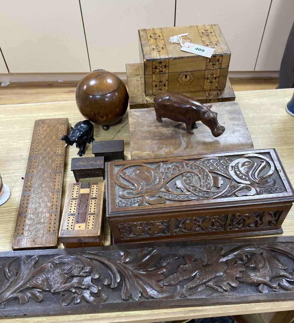 Three inlaid wooden boxes, a carved oak box, two cribbage boards and sundry treen, 19th/20th century